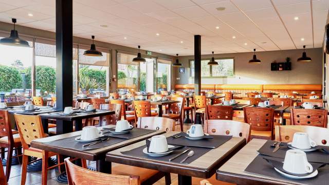Hôtel Restaurant Calvados Bord de Mer · Restaurant La Crémaillère